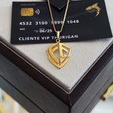Pingente Escudo De Fé Vazado 2,5x2cm Banhado A Ouro 18k
