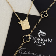 Kit Escapulário Espírito Santo Oração Pai Nosso e Pulseira Trevo Onix Banhado A Ouro 18k