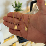 Escapulário Cadeado Alongado Sagrado Coração de Jesus 1,5mm 4gr 70cm Banhado A Ouro 18k